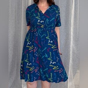 BloomChic Blue Midi Dress with Colorful Accents